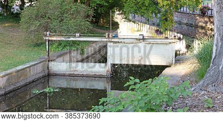 Regulating The Waterways In Colmar, France: Old Metal Lock