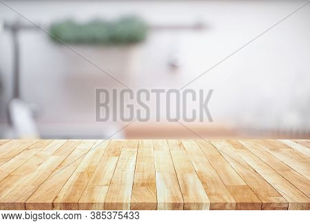 Wood Table Top On Blur Kitchen Counter (room)background.for Montage Product Display Or Design Key Vi