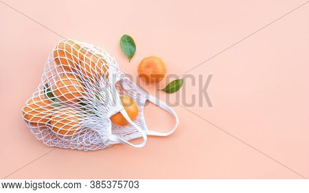 Fresh Orange From Garden In Crochet Bag.healthy And Nature Concepts.top View