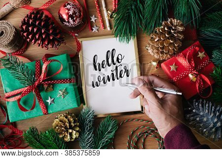 Merry Christmas Concepts With Human Hand Writing Greeting Cards With Gift Box Present And Ornament E