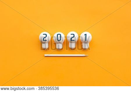 2021 Creativity And Nspiration Ideas Concepts With Lightbulb And Pencil On Color Background.business