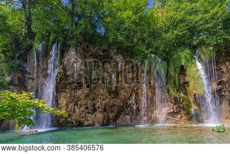 Falling Water Streams. Sunny Day. Galovac, Plitvice Lakes, Croatia.