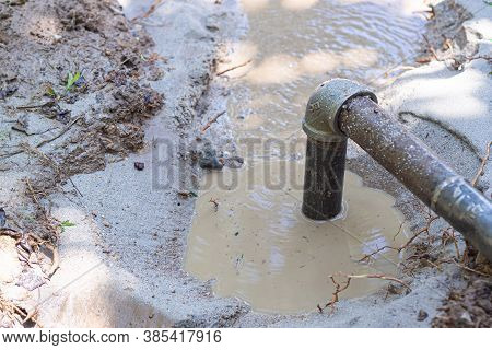 Close-up Of Pipe For Groundwater Drainage System Pumps Water Out Of The Ground. Solve The Drought