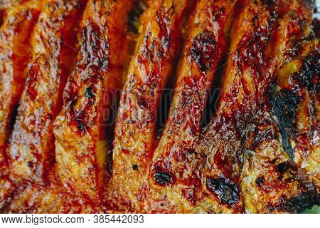 Delicious Grilled Tilapia (nila Bakar) From Indonesia With Rice, Tempeh, Vegetables, And Chilli Sauc