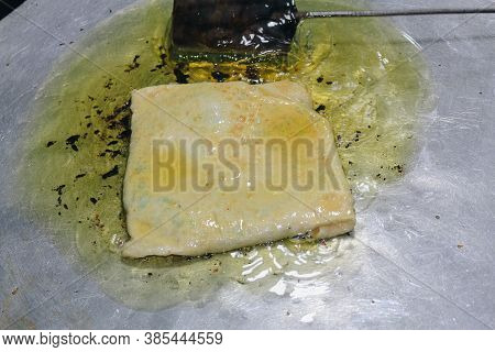 Martabak Telor Or Omelette Martabak. Savoury Pan-fried Pastry Stuffed With Egg, Meat And Spices. Tra