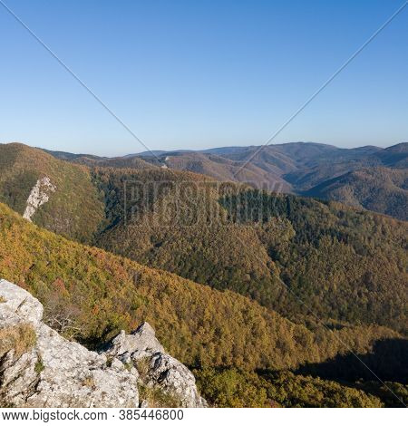 Scenic View From The Slope Of The Kozara Mountain Overgrown With Forest During A Sunny Day Against T