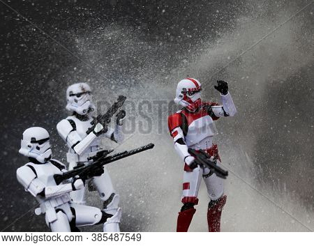 SEPTEMBER 13 2020: Imperial stormtroopers in battle with blast effect - Hasbro action figures