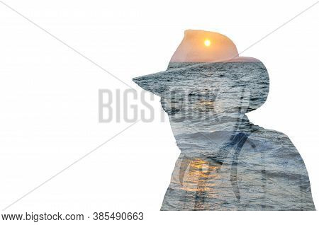Psychological Concept. Sunset Over The Sea Inside The Silhouette Of A Man. Double Exposure