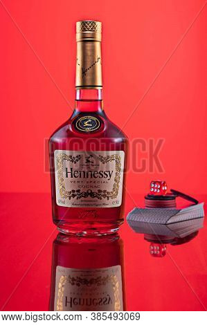 Kyiv, Ukraine - Sep 5, 2020: French Hennessy Cognac. Hennessy Bottle And Playing Cards. Vertical Fra