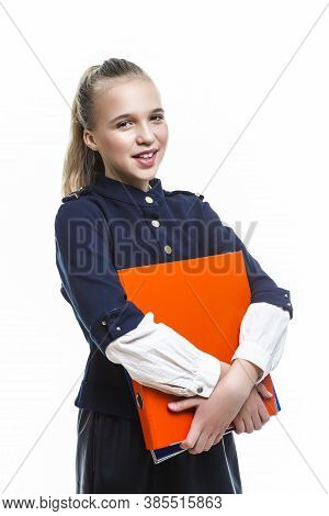 Portrait Of Smiling Caucasian Teenager Girl Posing With Batch Of Office Folders Against White Backgr