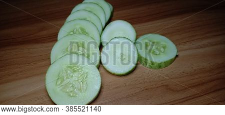 Testy And Healthy Fresh Cucumber On Tree And Cucumber Stock