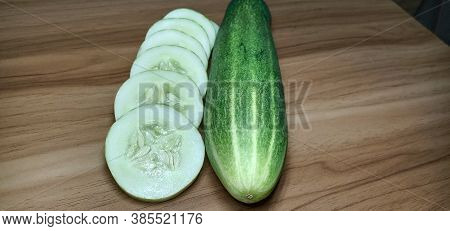 Testy And Healthy Fresh Cucumber On Tree And Cucumber Stock