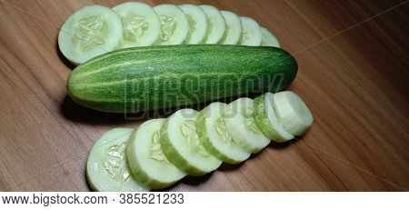 Testy And Healthy Fresh Cucumber On Tree And Cucumber Stock