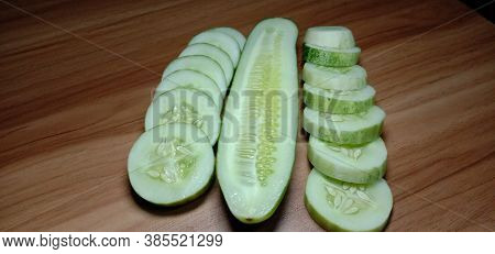 Testy And Healthy Fresh Cucumber On Tree And Cucumber Stock