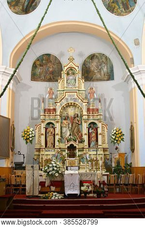 SVETI IVAN ZELINA, CROATIA - JUNE 26, 2013: High altar in the parish church of Saint John the Baptist in Sveti Ivan Zelina, Croatia