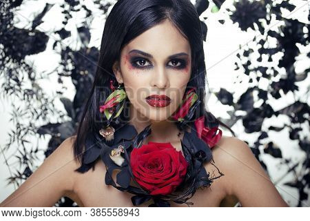 Pretty Brunette Woman With Rose Jewelry, Black And Red, Bright Make Up Kike A Vampire Closeup Red Li