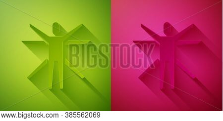 Paper Cut Vitruvian Man By Leonardo Da Vinci Icon Isolated On Green And Pink Background. Human Anato