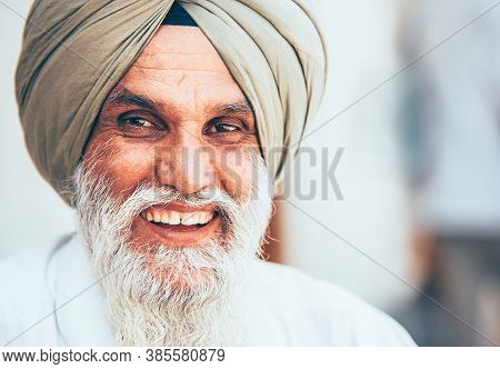 Amritsar, India - August 15, 2016: Smiling Sikh Portrait In The Sikhism Holy Amritsar City.