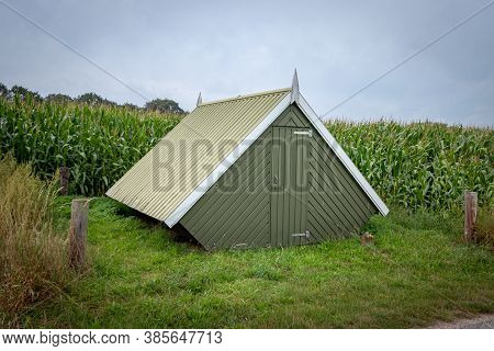 Small Green Salt Houses In The Dutch Twente Landscape With Pipes And Valves In The Houses For Extrac