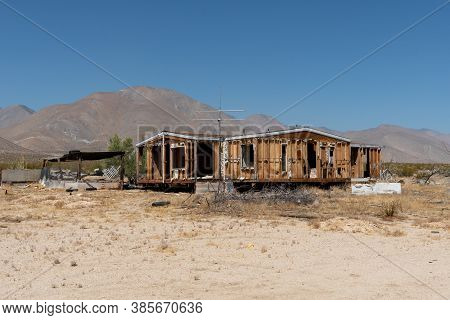 Abandoned House Camper Trailer In The Middle Of The Desert In Californias Mojave Desert, Near Ridgec