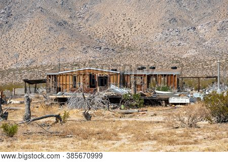 Abandoned House Camper Trailer In The Middle Of The Desert In Californias Mojave Desert, Near Ridgec