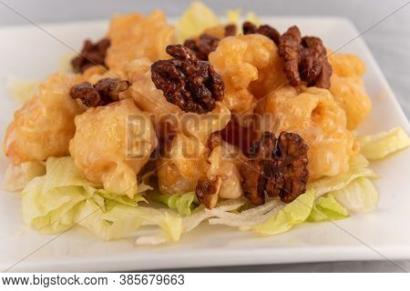 Detail View Of Appetizing Plate Tempting The Tastebuds With Honey Walnut Shrimp In Perfect Serving S