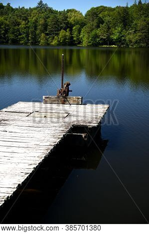 Wooden Deck On A Peaceful Lake, Portrait Format