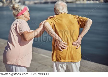 Senior Caucasian Man Suffering From Lumbar Neuralgia