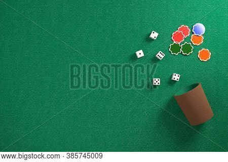 Top View Of Dice And Dice Cup And Chips On A Green Cloth. 3d Illustration.