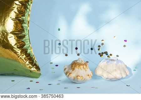 Halloween Decoration With White Pumpkins, Gold Balloon And Colorful Confetti On Blue Background. Tha