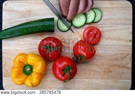Closeup Of Fresh Vegetables On A Wooden Board.
