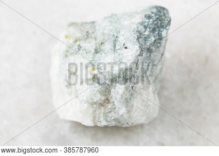 Closeup Of Sample Of Natural Mineral From Geological Collection - Rough Carbonatite Rock On White Ma