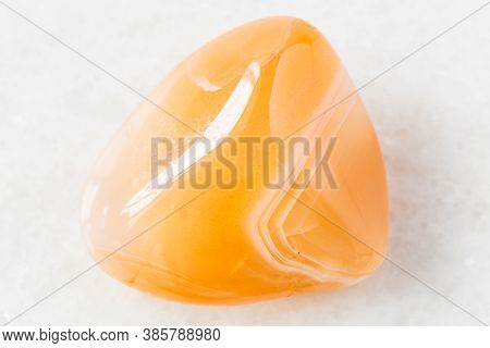 Closeup Of Sample Of Natural Mineral From Geological Collection - Tumbled Carnelian (cornelian) Rock