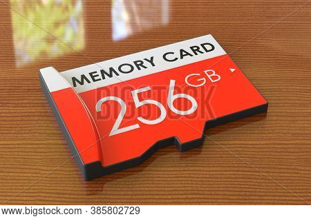 Memory Card 256 Gb On The Wooden Table. 3d Rendering