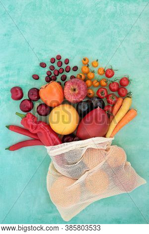 Fruit & vegetable collection very high in lycopene for a healthy heart with plant based foods also high in antioxidants, anthocyanins, dietary fibre, vitamins & minerals. Immune defence concept. 