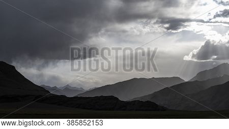 Bare Mountain In The Valley Of The River Murghab With Dark Rain Clouds Near The Village Of Murghab, 