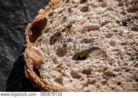Fresh Whole Grain Seeded Bread, Organic Wheat Flour, Closeup Slice Texture As Background For Food Bl