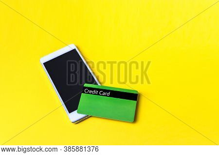 Credit Card And Smartfone As Virtual Payment Terminal. Online Shopping. Online Payment