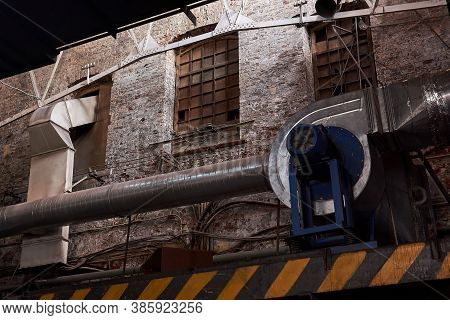 Fragment Of The Interior Of An Old Factory Hall With Vintage Equipment