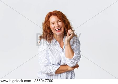 Beauty, Lifestyle And Aging Concept. Portrait Of Attractive Middle-aged Lady Laughing Out Loud, Look