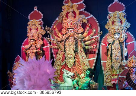 Goddess Durga Idol , Durga Puja Festival At Night. Shot Under Colored Light At Howrah, West Bengal, 