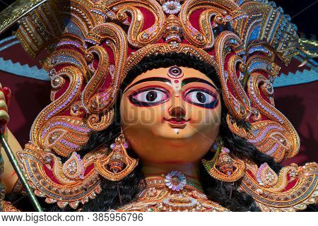 Face Of Goddess Durga Idol , Durga Puja Festival At Night. Shot Under Colored Light At Howrah, West 