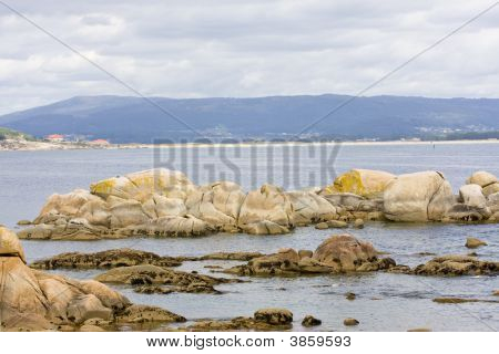 Rocks Sea And Mountain