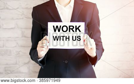 Woman Showing White Card With Work With Us Word . Business Concept