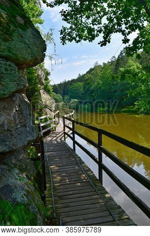 Wooden Footbridge Over The Water On A Hiking Trail Along The River Luznice, Southern Bohemia, Czech 