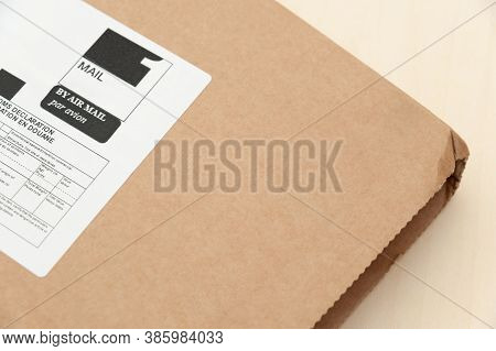 Mail Package With Label. International Shipping. Sent By Air Mail. Top View.