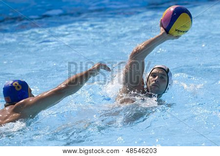 Jul 26 2009; Rome Italy; Germany team player Marko Savic throws a pass while competing in the waterpolo match between Germany and Montenegro at the 13th Fina World Aquatics Championships