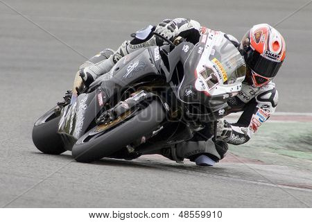 26 Září 2009; Silverstone Anglie: Rider číslo 11 Ian Lowry GBR koni pro neúnavné Suzuki durin
