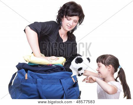 Woman And Daughter Hand Crammed Full Of Clothes And Shoulder Bag Isolated