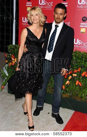 HOLLYWOOD - APRIL 26: Kylie Bax and Spiros Poros at the US Weekly Hot Hollywood Awards at Republic Restaurant and Lounge on April 26, 2006 in West Hollywood, CA.